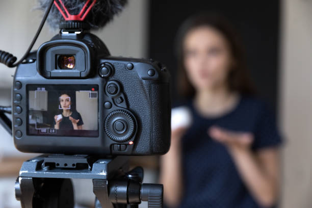 Bold collage of AI, mobile phones, live-stream controls, and shoppable video UI—representing 2025 video marketing trends